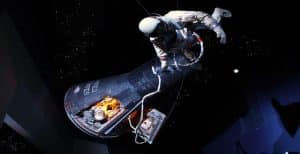 Astronaut in het ruimtevaartmuseum van Houston, Texas, met ruimtecapsule en sterren