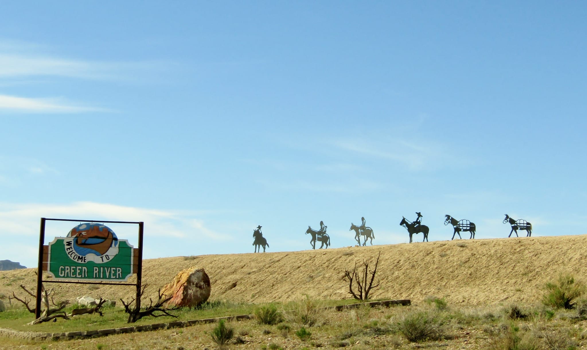 Welkomstbord van Green River met cowboysilhouetten in Utah